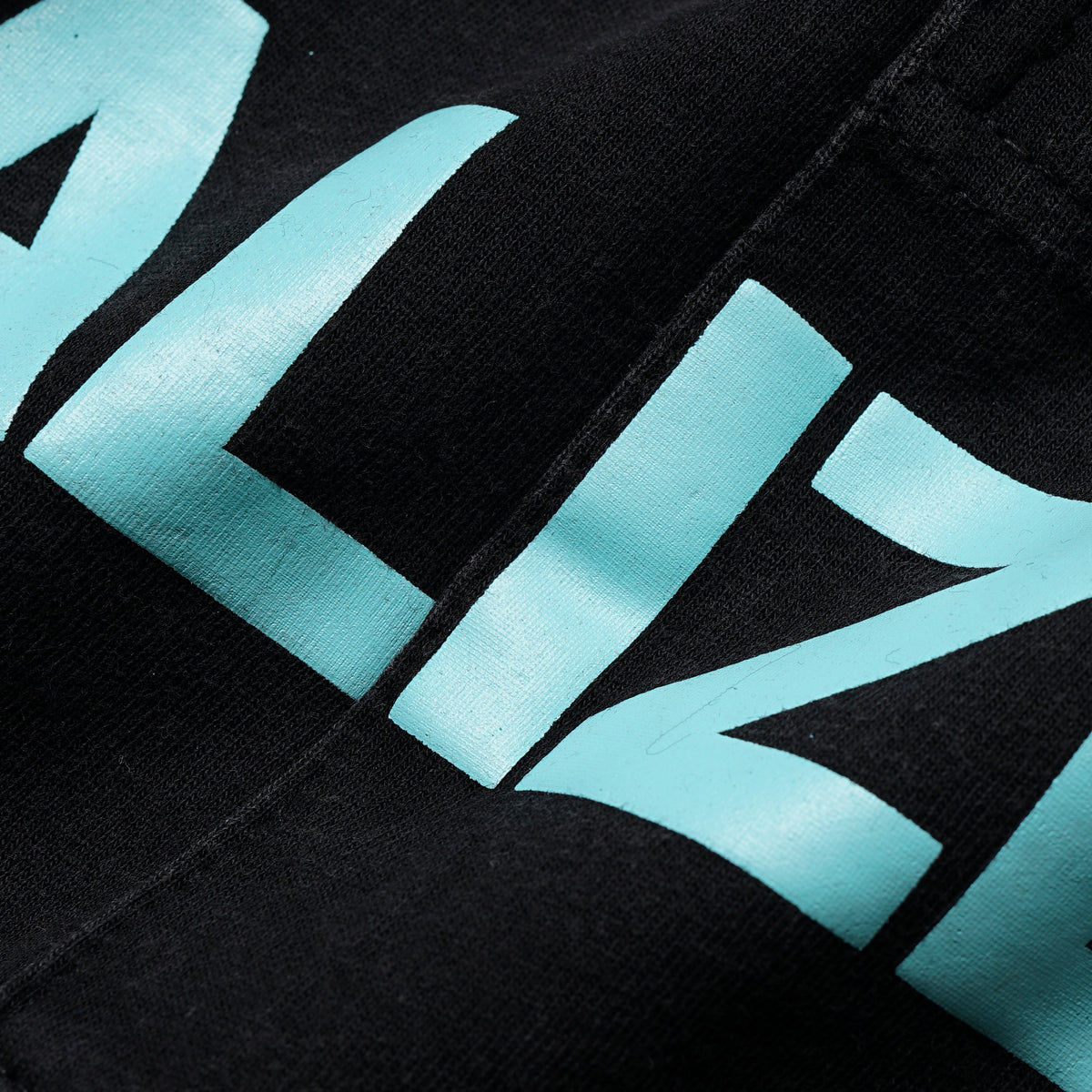 FEEL IT TEE - BLACKWASH/CYAN